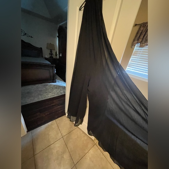 Black sheer romper over solid black. Scarf at the neck. - Picture 1 of 2